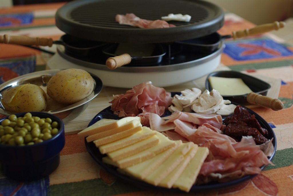 Raclette French dish potato cheese